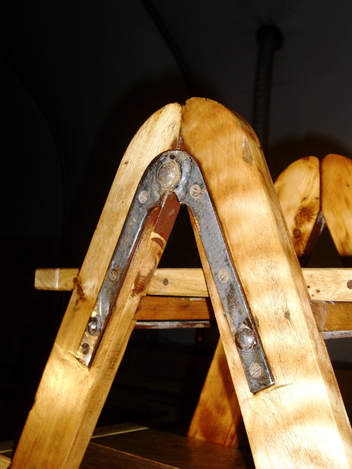  Elegant free-standing Solid Oak bookshelf made from a vintage set of Ash decorator’s trestles, detailed with contrasting Walnut dowels. Gloucestershire, UK. The Fine Wooden Article Company.