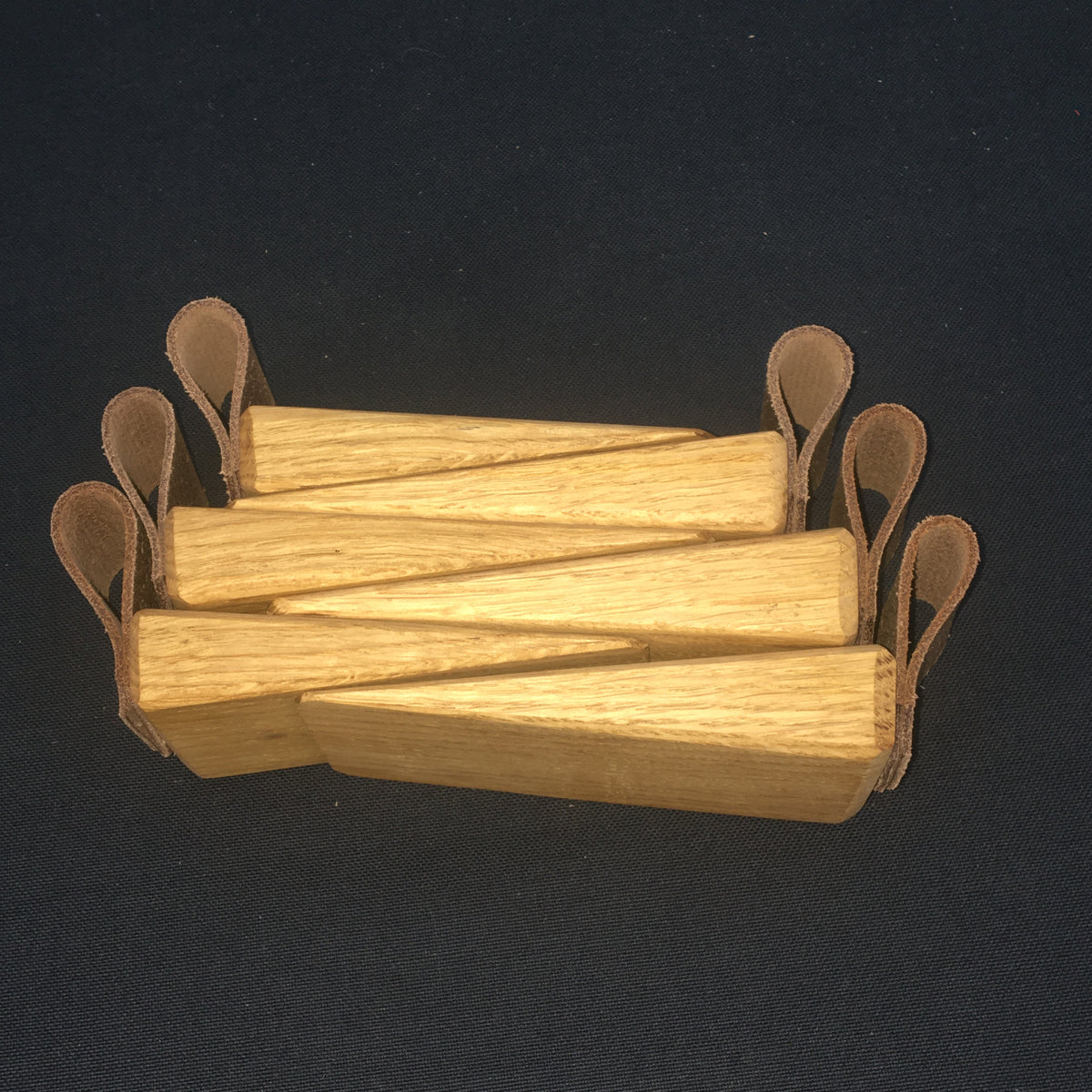 Door Wedges. Solid Oak door wedges with faux leather handle.