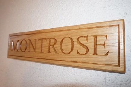 Medium solid oak rectangular House Name Sign, bespoke, hand engraved, High Quality, durable, standard crafted in our wood working workshop, Gloucestershire, UK. The Fine Wooden Article Company.