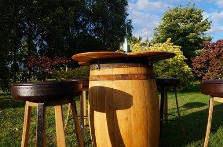 Four-leaf clover table from vintage Oak wine barrels with stools: home interiors, restaurant &amp; catering events. Handcrafted in our Gloucestershire workshop. The Fine Wooden Article Company.
