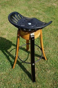Bar stool design from vintage cast iron tractor seat &amp; genuine French Oak wine barrels, for homes, restaurants. Handcrafted in our Gloucestershire workshop, UK. The Fine Wooden Article Company.