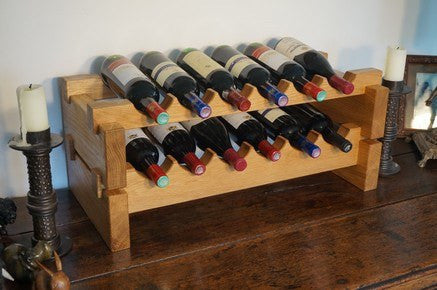 A 12 bottle free-standing wine rack handcrafted in our workshop from sustainably sourced solid Oak, Walnut, Wenge or Bamboo for home &amp; commercial interiors UK. The Fine Wooden Article Company.