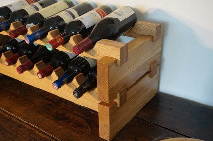 A 12 bottle free-standing wine rack handcrafted in our workshop from sustainably sourced solid Oak, Walnut, Wenge or Bamboo for home &amp; commercial interiors UK. The Fine Wooden Article Company.